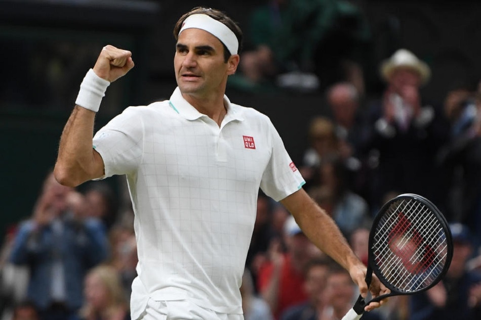 Roger Federer of Switzerland celebrates winning his 4th round match at the Wimbledon Championships, in London, Britain, on July 5, 2021. Neil Hall, EPA-EFE/file