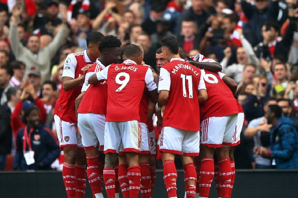 Arsenal players celebrate their 1-0 lead during the English Premier League soccer match between Arsenal FC and Tottenham Hotspur in London, Britain, 01 October 2022. Neil Hall, EPA-EFE.