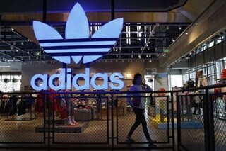 Adidas cuts forecast amid global economic gloom