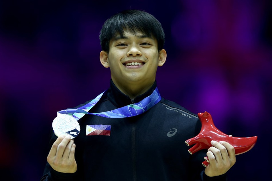 Yulo poses with his silver medal during the medal ceremony for the vault event at the 51st FIG Artistic Gymnastics World Championships in Liverpool, on November 6, 2022. Adam Vaughan, EPA-EFE