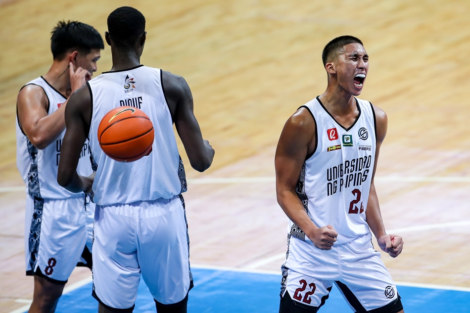 Zavier Lucero (22) of the UP Fighting Maroons reacts during their match against the NU Bulldogs at the University Athletic Association of the Philippines (UAAP) Season 85 held at the Mall of Asia Arena in Pasay City, October 12, 2022. George Calvelo, ABS-CBN News