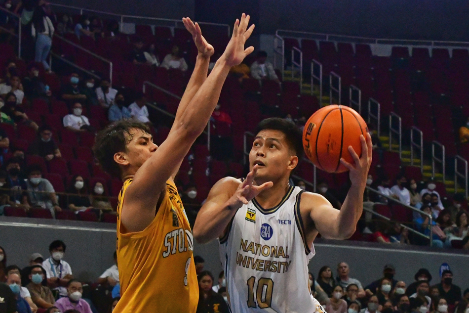 National U's John Lloyd Clemente (10) in action against University of Santo Tomas (UST) battle during the second round of the UAAP season 85 men's basketball in Pasay City on November 20, 2022. Mark Demayo, ABS-CBN News.