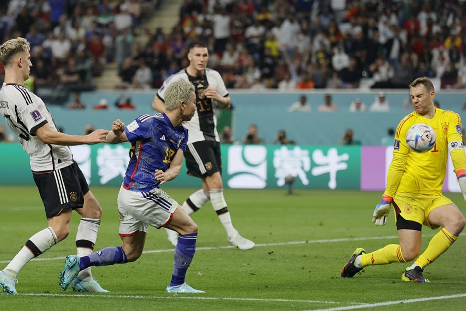 Takuma Asano of Japan scores the 2-1 lead during the FIFA World Cup 2022 match against Germany in Doha, Qatar, on November 23, 2022. Ronald Wittek, EPA-EFE