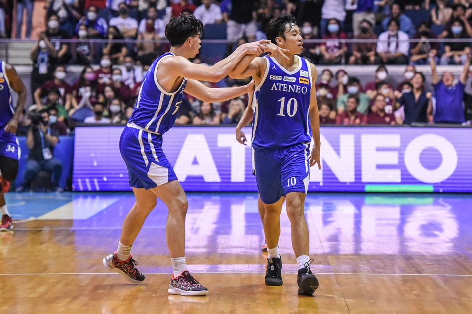 Ateneo's Dave Ildefonso celebrates after making a big shot against the UP Fighting Maroons. UAAP Media.