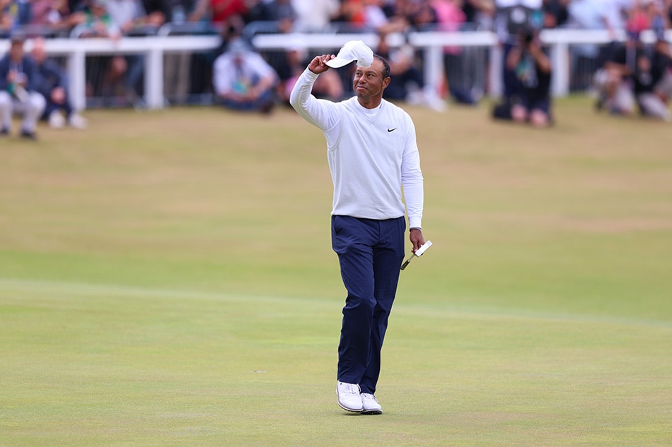 Tiger Woods waves at the end of the second round at the 150th Open Golf Championships in St. Andrews, Scotland, Britain, 15 July 2022. Robert Perry, EPA-EFE.