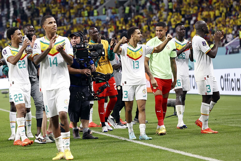 Iliman Ndiaye Senegal (C) reacts with teammates after winning the FIFA World Cup 2022 group A soccer match between Ecuador and Senegal at Khalifa International Stadium in Doha, Qatar, 29 November 2022. EPA-EFE/Rolex dela Pena