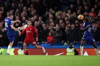 Football: Chelsea fight back to hold Liverpool
