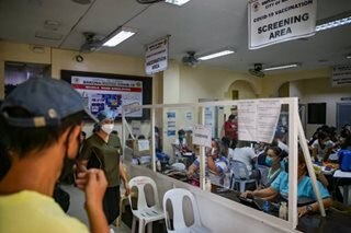 Manila COVID vaccination queue doubles 