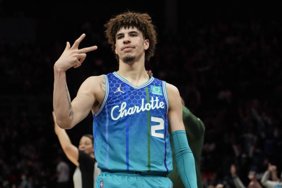 Charlotte Hornets guard LaMelo Ball (2) reacts after making a three point basket against the Milwaukee Bucks during the second period at the Spectrum Center. Jim Dedmon, USA TODAY Sports/Reuters.