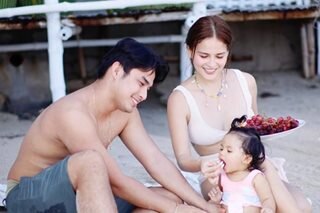 McCoy, Elisse take daughter to first beach trip