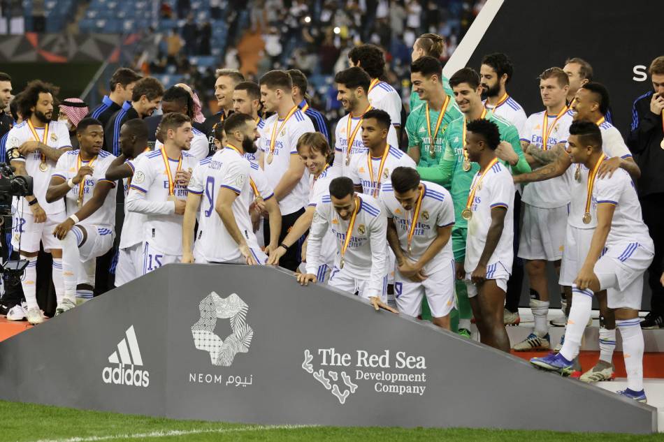 Real Madrid players celebrate after winning the Spanish Super Cup. Ahmed Yosri, Reuters.