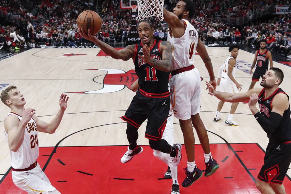 Chicago Bulls forward DeMar DeRozan (11) goes to the basket against the Cleveland Cavaliers during the second half at United Center. Kamil Krzaczynski, USA TODAY Sports/Reuters.