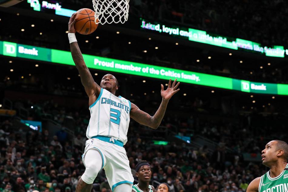 Charlotte Hornets guard Terry Rozier (3) shoots during the first half against the Boston Celtics at TD Garden. Paul Rutherford, USA TODAY Sports/Reuters.