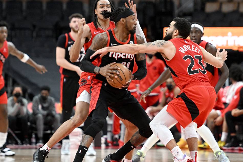Portland Trail Blazers guard Ben McLemore (23) moves the ball against Toronto Raptors guards Fred VanVleet (23) and Dalano Banton (45) in the second half at Scotiabank Arena. Dan Hamilton, USA TODAY Sports/Reuters.