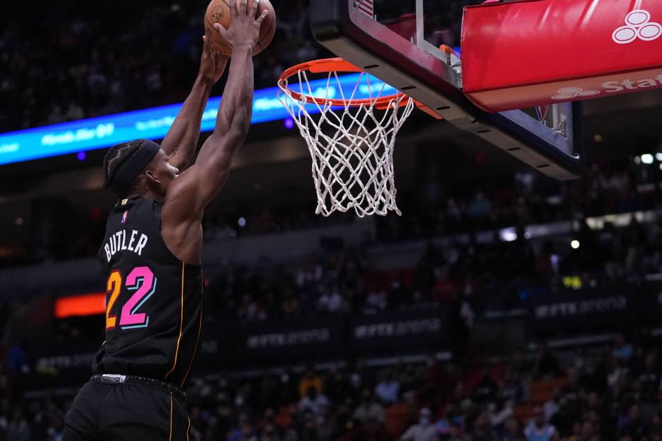 Miami Heat forward Jimmy Butler (22) dunks the ball against the Los Angeles Lakers during the first half at FTX Arena. Jasen Vinlove, USA TODAY Sports/Reuters.