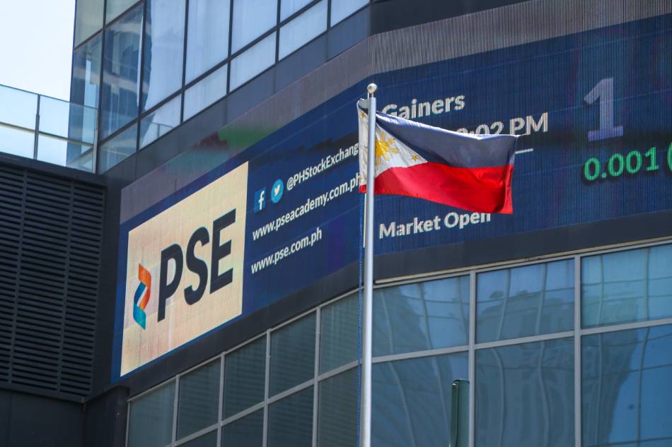 Philippine flags fly outside the Philippine Stock Exchange at Bonifacio Global City in Taguig on June 18, 2021. Jonathan Cellona, ABS-CBN News/File