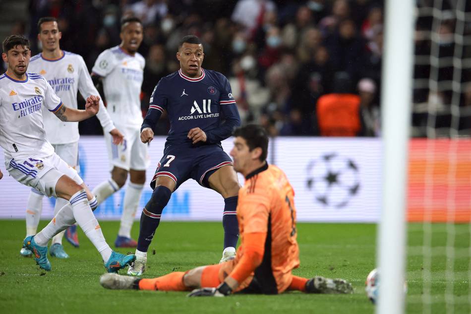 Paris St Germain's Kylian Mbappe scores their first goal. Sarah Meyssonnier, Reuters.