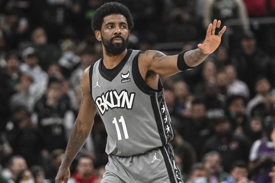 Brooklyn Nets guard Kyrie Irving (11) reacts during a timeout in the fourth quarter against the Milwaukee Bucks at Fiserv Forum. Benny Sieu, USA TODAY Sports/Reuters.
