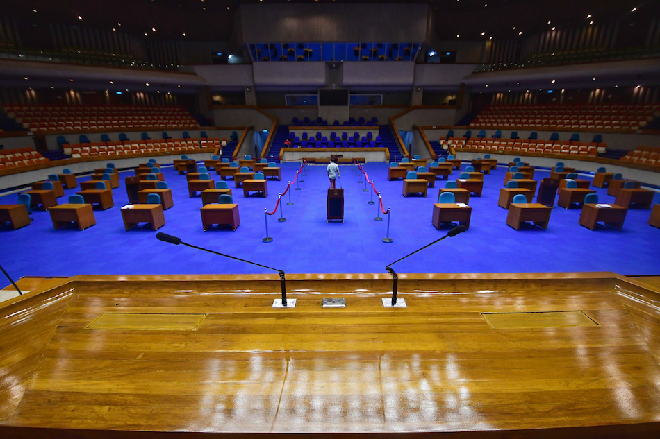 Maintenance workers clean the House of Representatives in Quezon City on Monday, in preparation for President Rodrigo Duterte