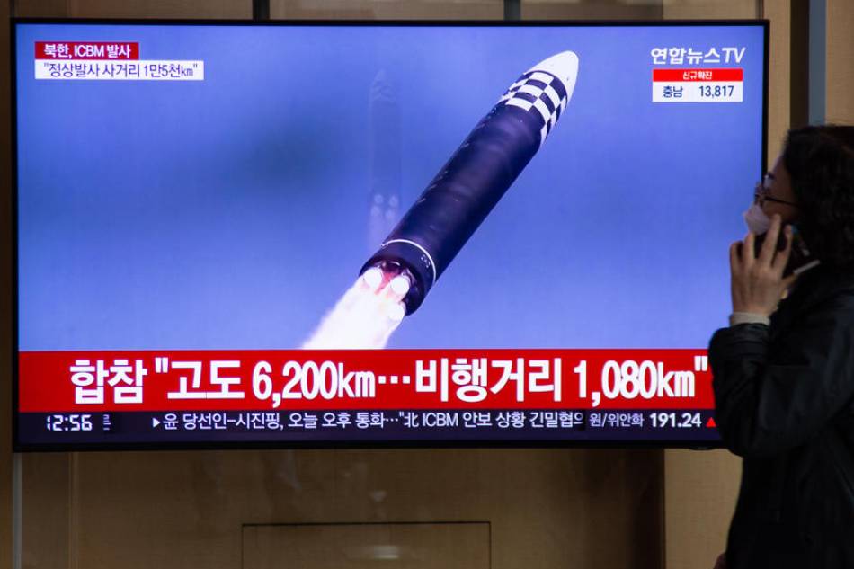 A woman watches the news at a station in Seoul, South Korea, on March 25, 2022. According to South Korea's national defense ministry on 25 March, North Korea launched a new intercontinental ballistic missile (ICBM) named Hwasongho-17 on March24. Jeon Heon-Kyun, EPA-EFE