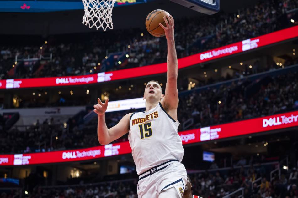 Nba Jokics Triple Double Leads Nuggets Past Hornets Abs Cbn News