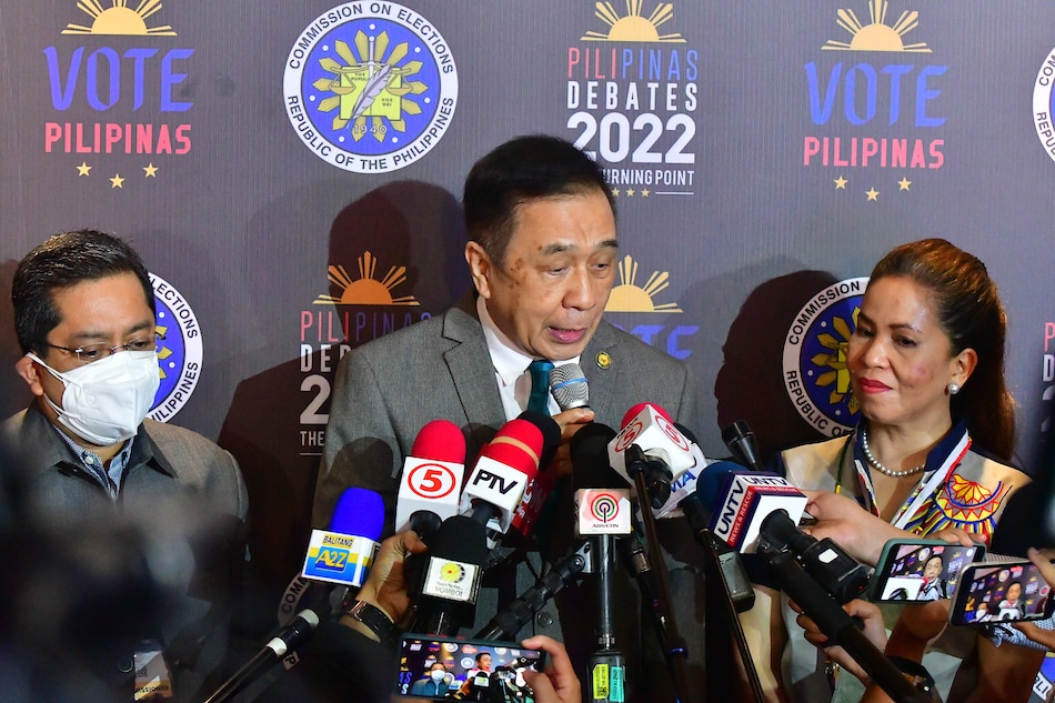 Comelec Chairperson Saidamen Balt Pangarungan (center) joins Comelec Commissioners George Garcia (left) and Aimee Ferolino (right) during an interview after the #PilipinasDebates2022: The Turning Point – The Vice Presidential Debate at the Sofitel Tent in Pasay City on March 20, 2022. Mark Demayo, ABS-CBN News