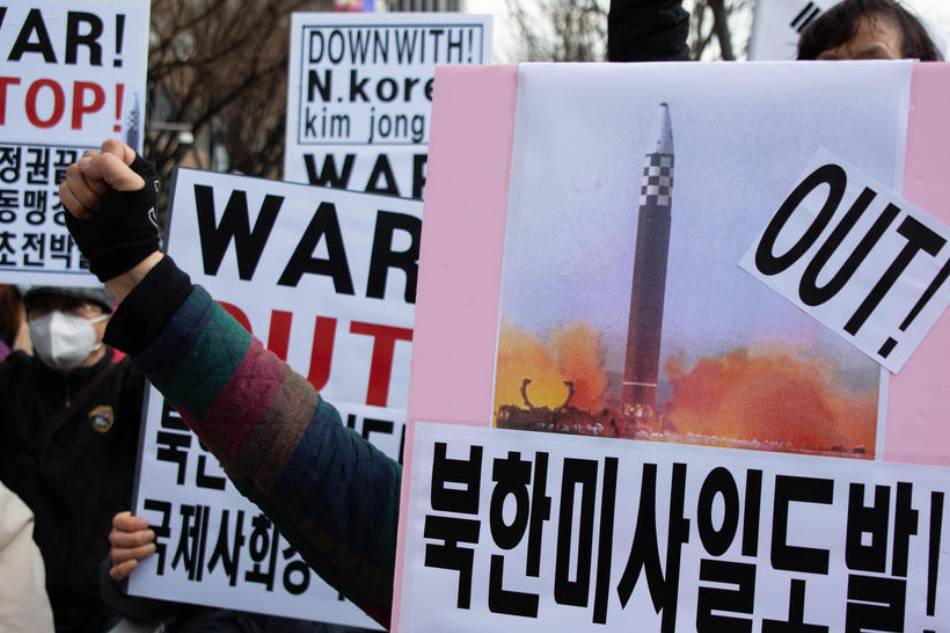 Members of a South Korean conservative group hold placards during a rally against the North Korean government, in Seoul, South Korea, March 26, 2022. The rally was organized in light of North Korea’s latest intercontinental ballistic missile (ICBM) test on March 24. Jeon Heon-Kyun, EPA-EFE 