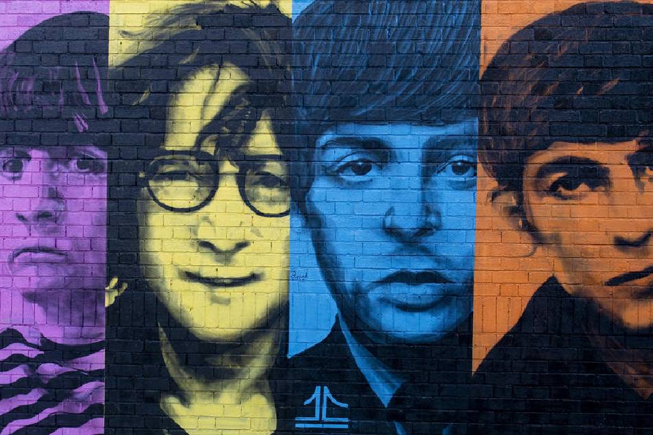 A mural of the Beatles is painted onto a wall in the Baltic Triangle area Liverpool, Britain, Oct. 14 2020. Peter Powell, EPA-EFE/File