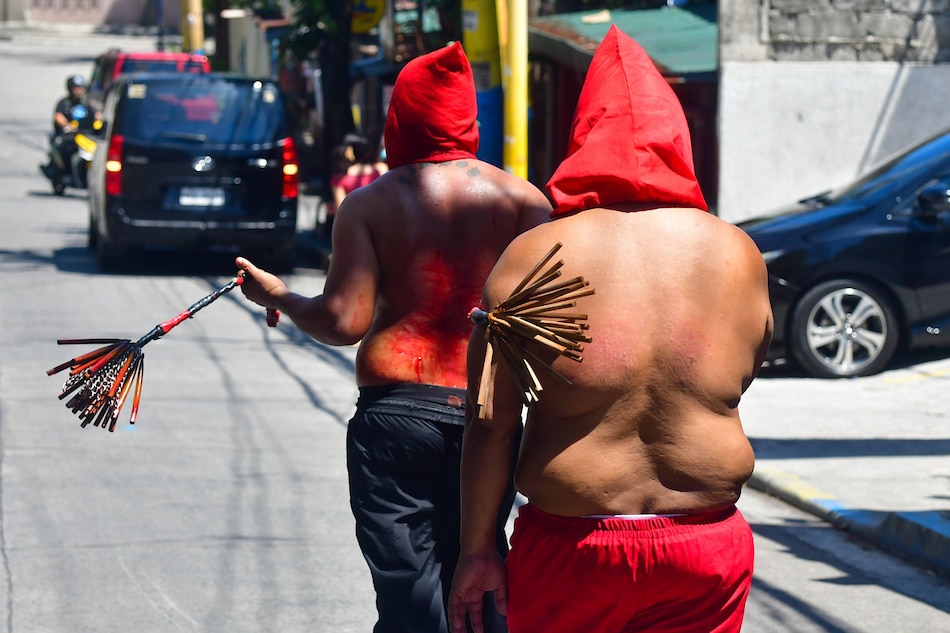 Penitents perform self-flaggellation as part of their Holy Week penitence in Mandaluyong on Maundy Thursday, April 14, 2022. Mark Demayo, ABS-CBN News