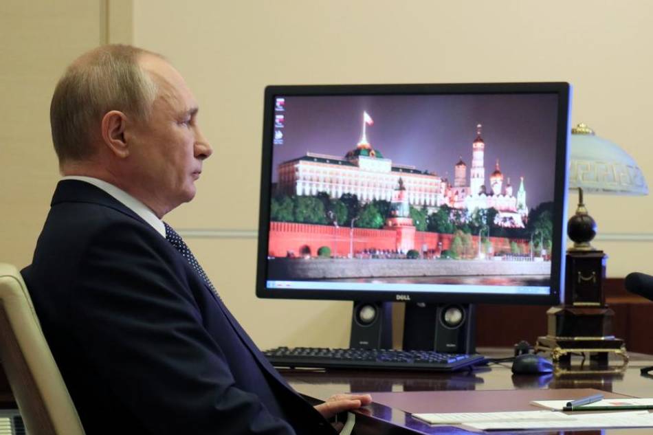 Russian President Vladimir Putin during a session of the G20 summit of world leaders, via teleconference in Moscow, Russia, 31 October 2021. Evgeniy Paulin/Sputnik/Kremlin Pool via EPA-EFE/File