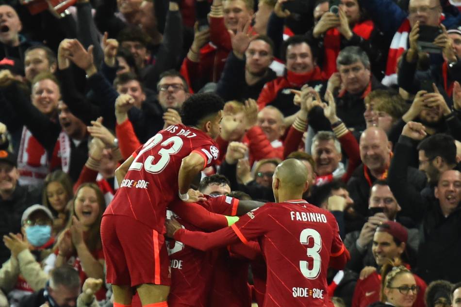 Liverpool players celebrate the 1-0 lead during the UEFA Champions League semi final, first leg soccer match between Liverpool FC and Villarreal CF in Liverpool, Britain, 27 April 2022. Peter Powell, EPA-EFE.