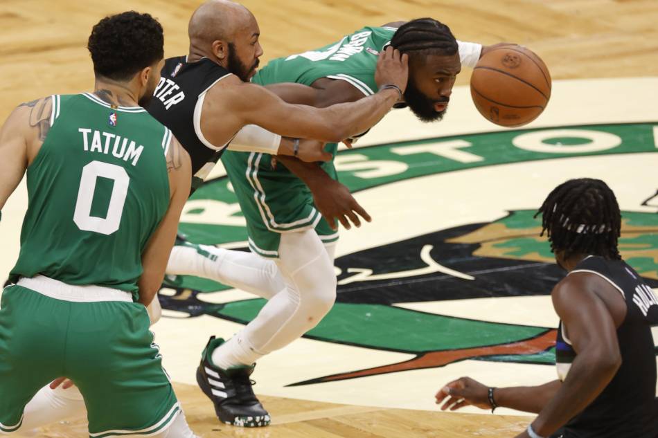 Boston Celtics guard Jaylen Brown (C) in action against Milwaukee Bucks center Bobby Portis (2-L) during the first half of the NBA Eastern Conference semifinal playoff game two between the Boston Celtics and the Milwaukee Bucs at TD Garden in Boston, Massachusetts, USA, 03 May 2022. CJ Gunther, EPA-EFE.