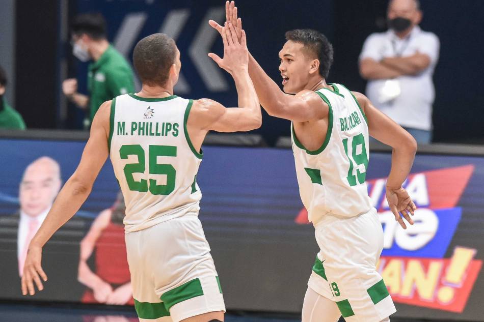 La Salle center Justine Baltazar high-fives Michael Phillips after a play against UP in their UAAP Season 84 Final 4 game. UAAP Media.