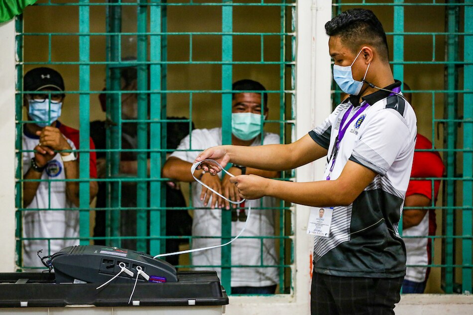 Members of the Electoral Board process the precinct's ballots as voting ends at the Mariano Marcos Memorial Elementary School in Batac Ilocos Norte on May 9, 2022. Jonathan Cellona, ABS-CBN News