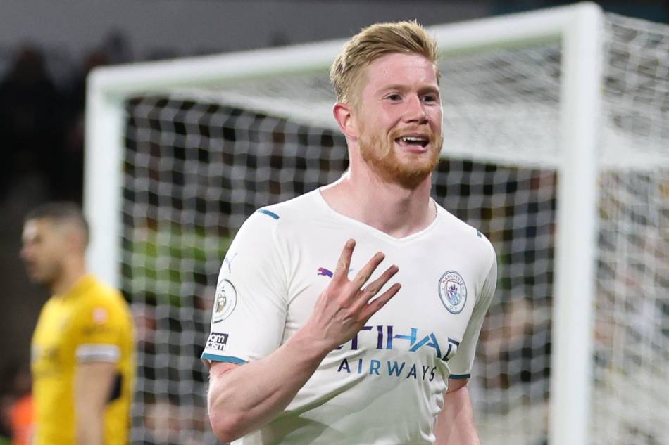Kevin De Bruyne of Manchester City celebrates after scoring the 4-1 lead during the English Premier League soccer match between Wolverhampton Wanderers and Manchester City in Wolverhampton, Britain, 11 May 2022. Paul Currie, EPA-EFE.