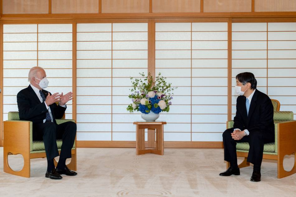 This handout photo taken and provided on May 23, 2022 by Japan's Imperial Household Agency shows US President Joe Biden (L) meeting with Japan's Emperor Naruhito at the Imperial Palace in Tokyo. Imperial Household Agency/AFP/Handout 