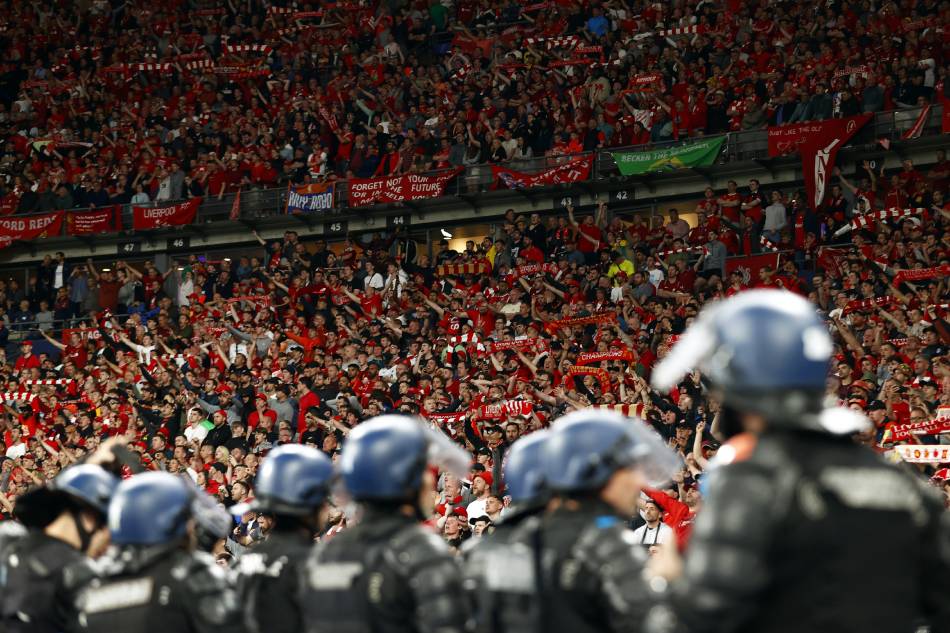 French riot police in front of Liverpool supporters at the end of the UEFA Champions League final between Liverpool FC and Real Madrid at Stade de France in Saint-Denis, near Paris, May 28 2022. Yoan Valat, EPA-EFE
