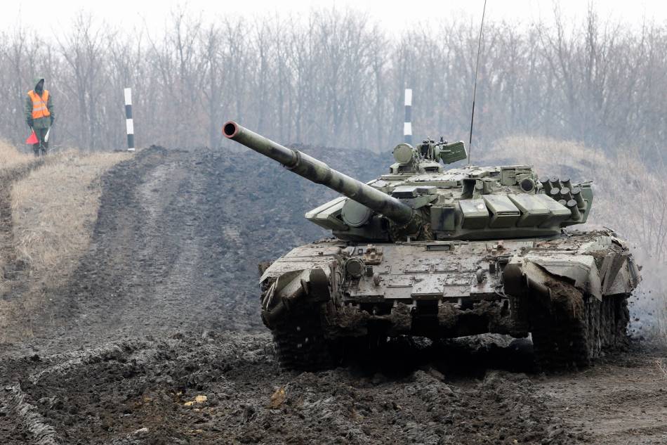 A tank of pro-Russian militants of self-proclaimed Donetsk People's Republic (DPR) rides during a military exercise at a shooting range not far from them controlled city of Gorlivka, Ukraine, 28 January 2020. Margarita Simonyan, the Chief Editor of the state-controlled international television network 'Russia Today' called Russia to annex all territory of Donbas during the 'Russian Donbass Forum' in Donetsk today. EPA-EFE/DAVE MUSTAINE