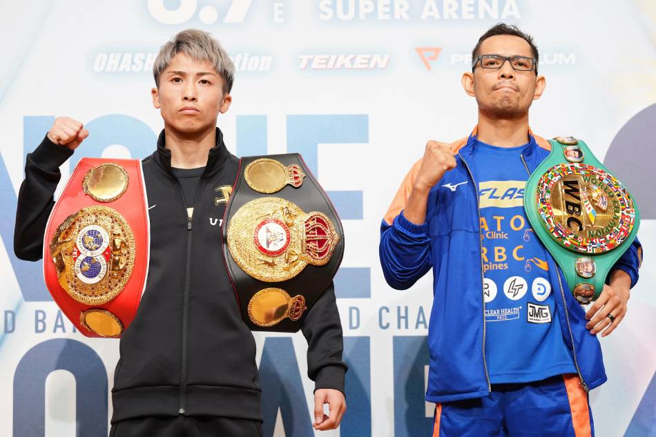 WBA and IBF bantamweight champion Naoya Inoue of Japan (L) poses with WBC bantamweight champion Nonito Donaire of the Philippines during a press event in Yokohama, near Tokyo, Japan, 03 June 2022. EPA-EFE/JAPAN POOL