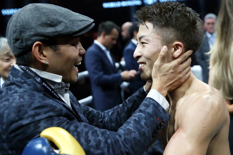 Naoya Inoue (R) of Japan celebrates with Filipino-American boxer Nonito Donaire after beating Emmanuel Rodriguez of Puerto Rico during their Bantamweight World Boxing Super Series (WBSS) semi final and IBF World Championship bout in Glasgow, Britain, 18 May 2019. File photo. Robert Perry, EPA-EFE.