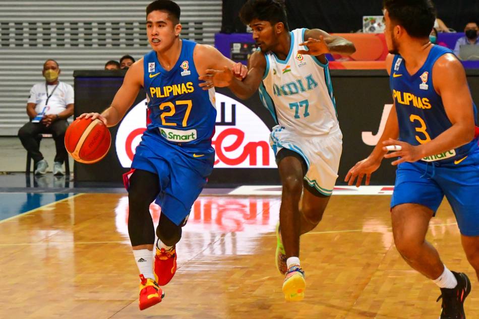 Gilas Pilipinas player Samjosef Belangel (27) dribbles past India's point guard Arvind Kumar Muthu Krishnan during the FIBA World Cup Asian Qualifiers in Pasay City on July 3, 2022. Mark Demayo, ABS-CBN News
