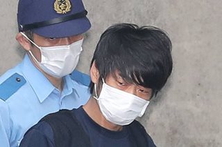 Abe killer tested homemade gun at religious group's facility: sources