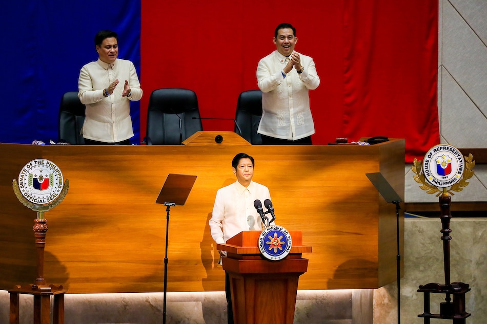 President Ferdinand Marcos Jr., delivers his first State of the Nation Address at the Batasan Complex on July 25, 2022 as Senate President Migz Zubiri (L) and House Speaker Martin Rimualdez look on Jonathan Cellona, ABS-CBN News