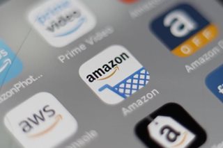 Amazon, Apple beat expectations in gloomy earnings season