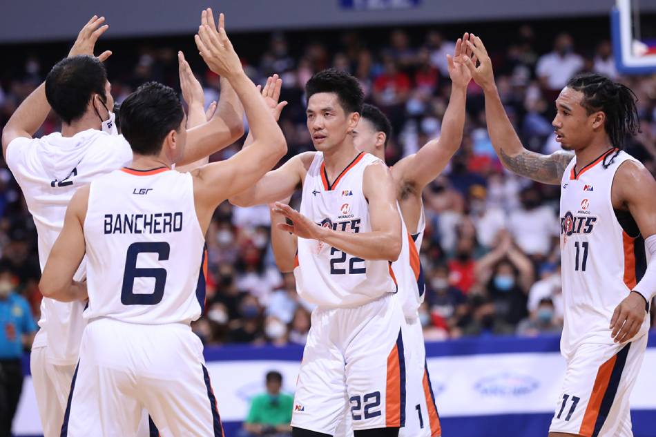 The Meralco Bolts celebrate after a big shot against Barangay Ginebra in Game 3 of their PBA Philippine Cup quarterfinal series. PBA Images.