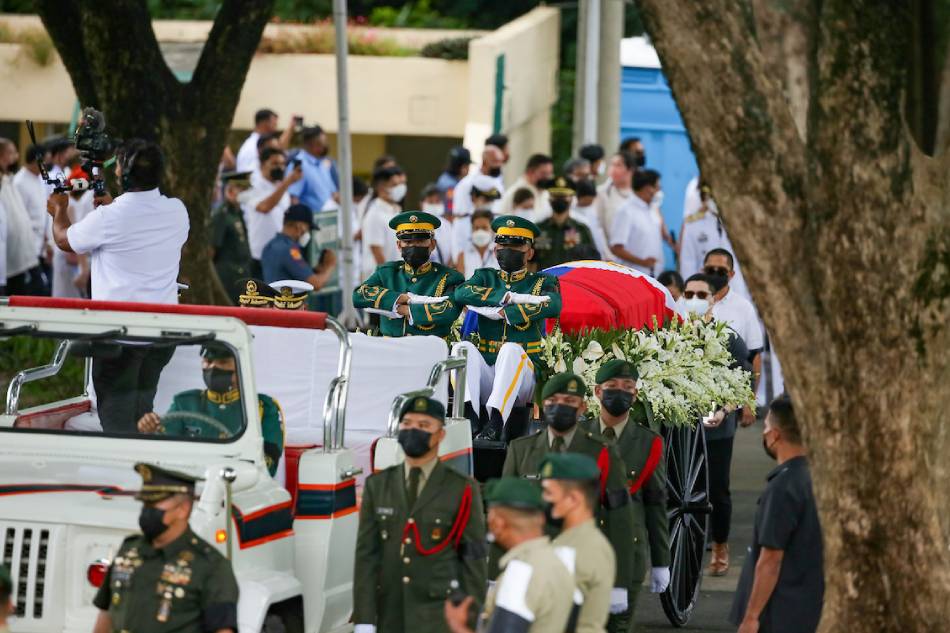 Military honor guards carry the cremated remains of the late President Fidel V. Ramos during the state funeral at the Libingan ng mga Bayani on Aug. 9, 2022. Jonathan Cellona, ABS-CBN News