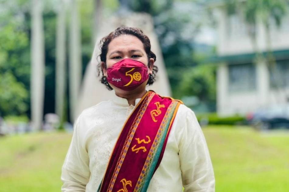 Charles Aguinaldo graduates from UPLB after a bout with leprosy and tongue cancer.