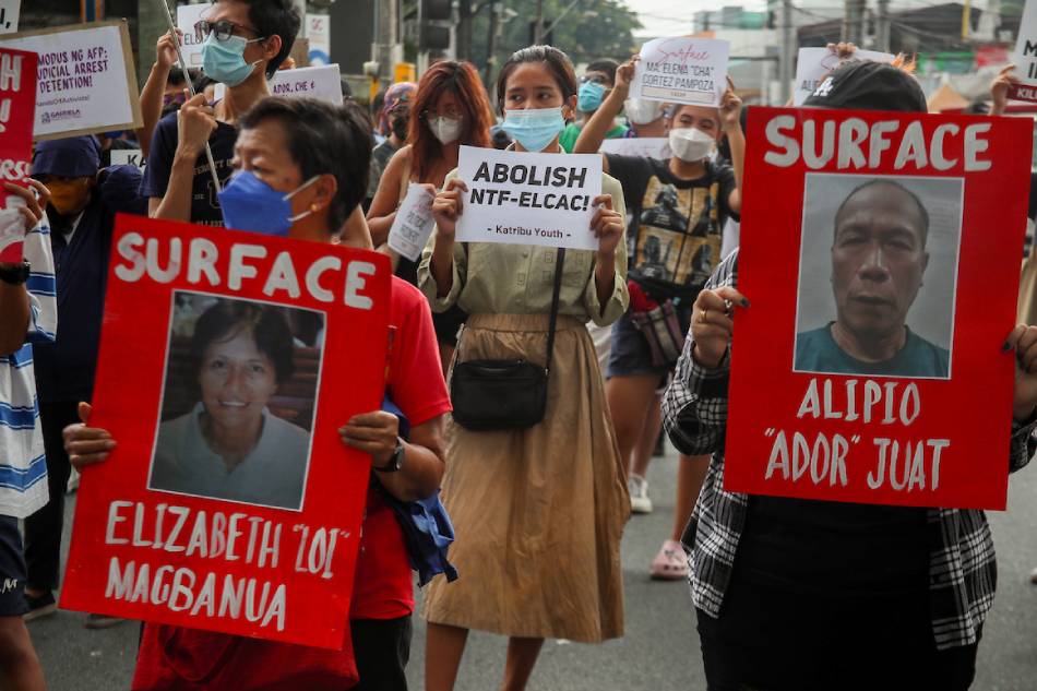 Women’s groups, led by Gabriela, hold a protest at the gates of the Armed Forces of the Philippines headquarters at Camp Aguinaldo in Quezon City on July 22, 2022. Jonathan Cellona, ABS-CBN News