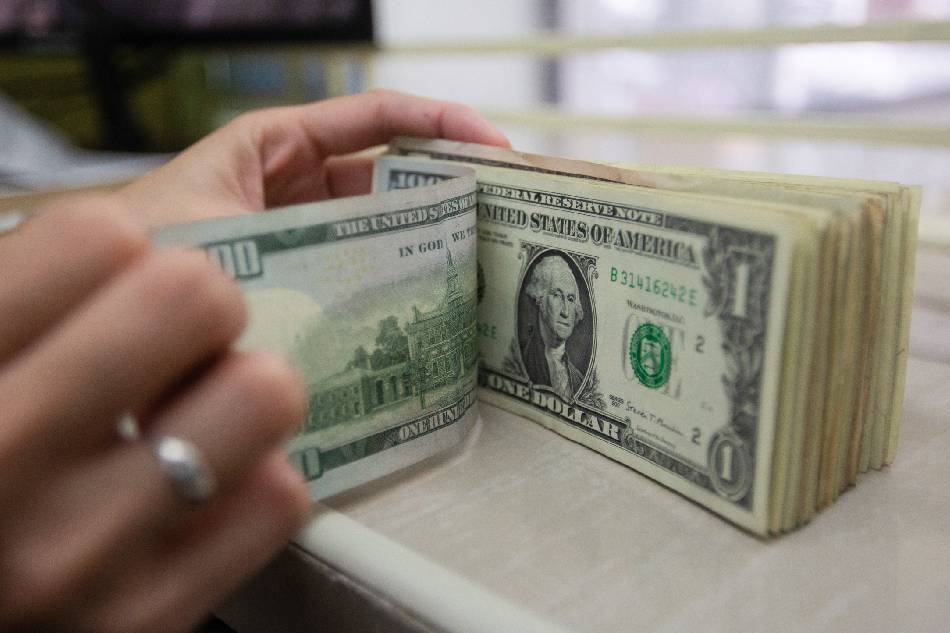 dollar extends gains on fed rate hike expectations | abs-cbn news