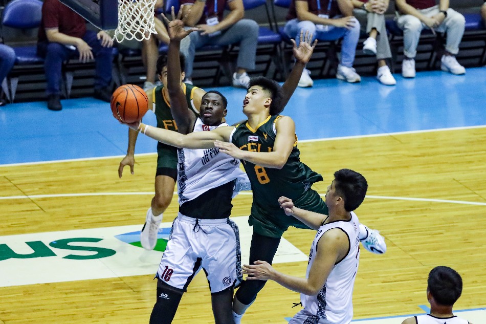 Cholo Anonuevo (8) of the Far Eastern University (FEU) Tamaraws during their match against the University of the Philippines (UP) Fighting Maroons for the University Athletic Association (UAAP) Season 85 elimination round held at the Araneta Coliseum in Cubao, Quezon City on October 8, 2022. George Calvelo, ABS-CBN News